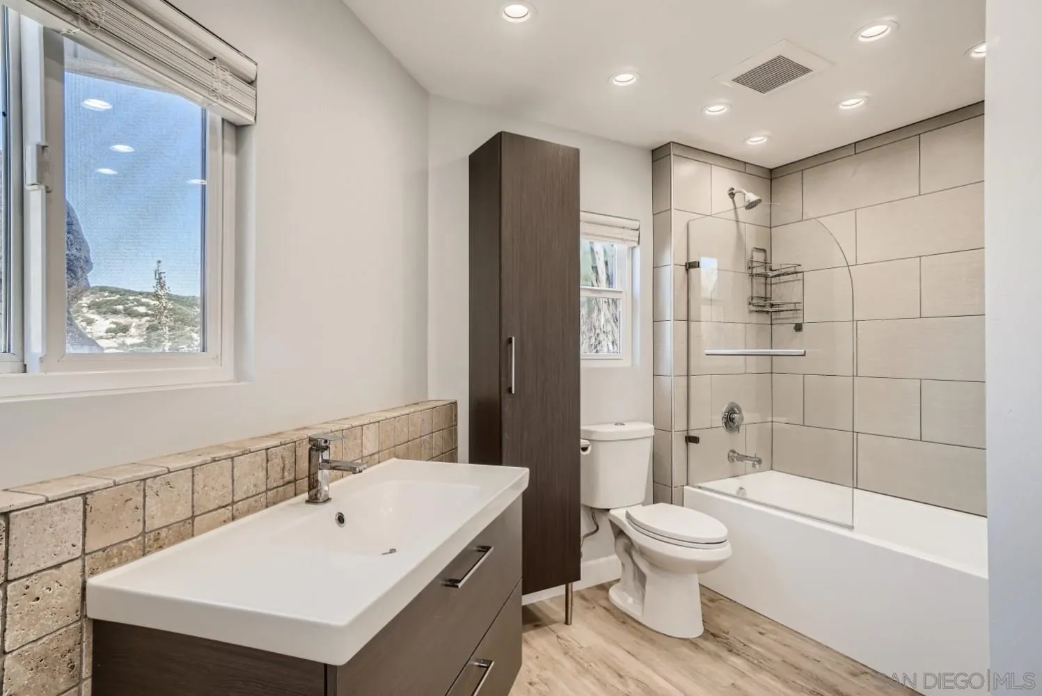 20555 Bee Valley Road Jamul, CA 91935 - Photo 17 of 33 a bathroom with a sink toilet and shower