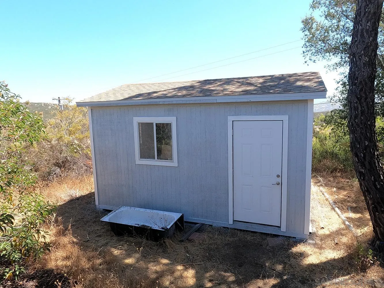 20555 Bee Valley Road Jamul, CA 91935 - Photo 32 of 33 a backyard of a house