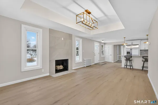 a view of livingroom with furniture and fireplace