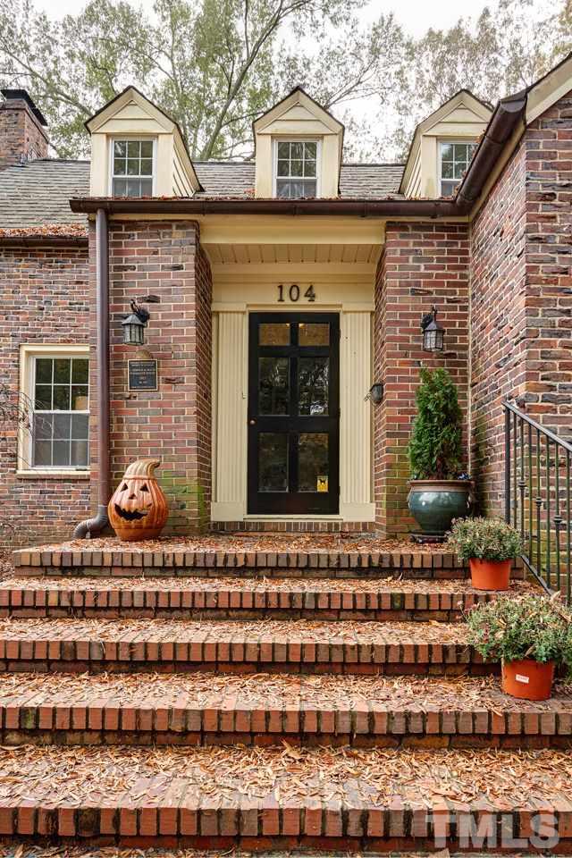 104 Briarcliff Road Durham, NC 27707 - Photo 3 of 23 The slate walkway leads to these wide, graceful, brick stairs, with wrought iron details, welcoming you and your guests to this lovely 1937 home.