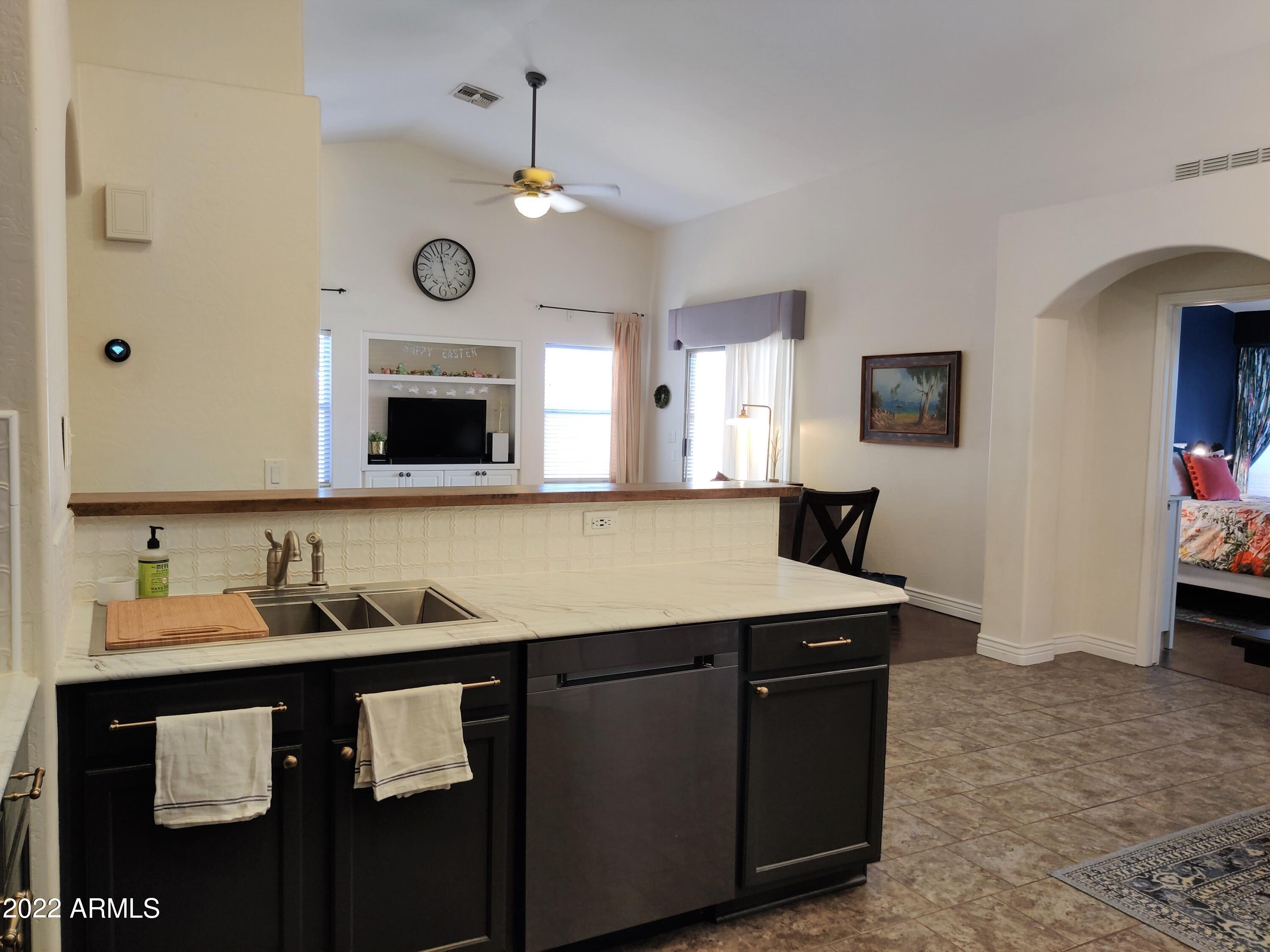 3242 East Bonanza Road Gilbert, AZ 85297 - Photo 8 of 23 Kitchen to Family Room