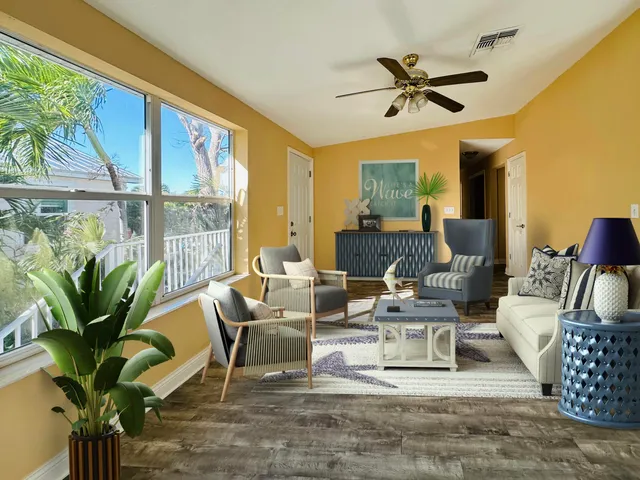 a bedroom with a bed dresser and a window