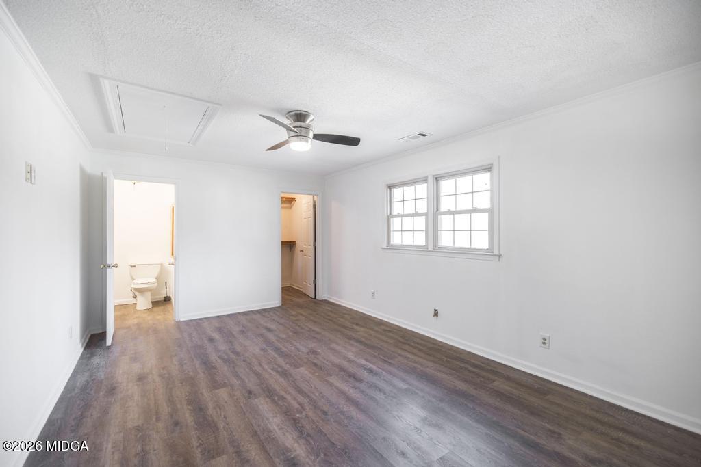 5624 Rogers Road Lizella, GA 31052 - Photo 28 of 39 a view of empty room with wooden floor and fan