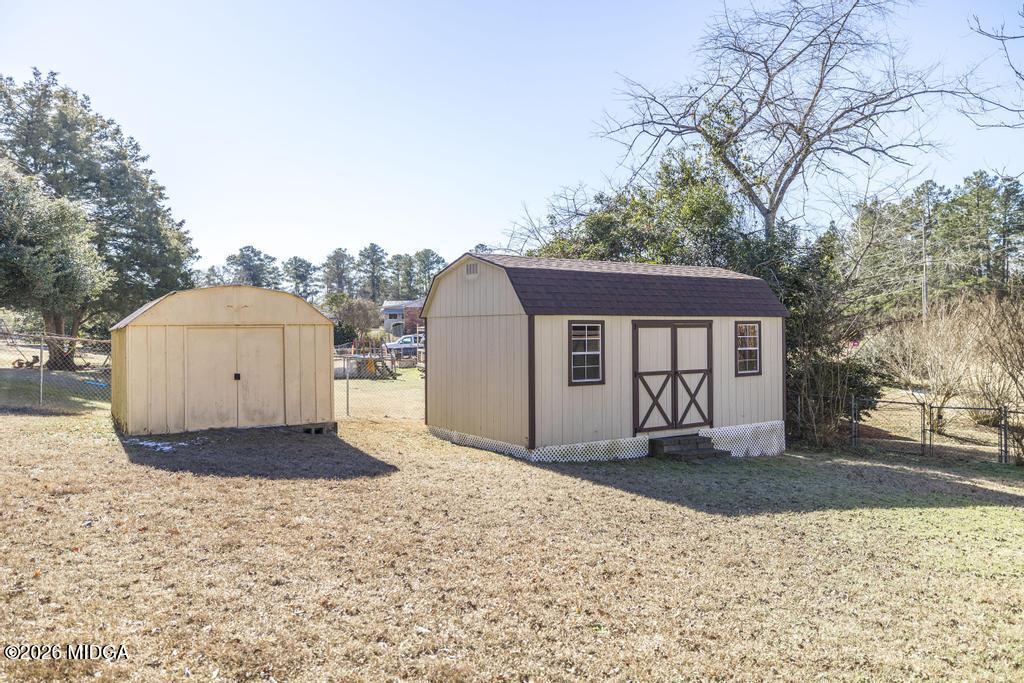 5624 Rogers Road Lizella, GA 31052 - Photo 39 of 39 a front view of a house with a yard