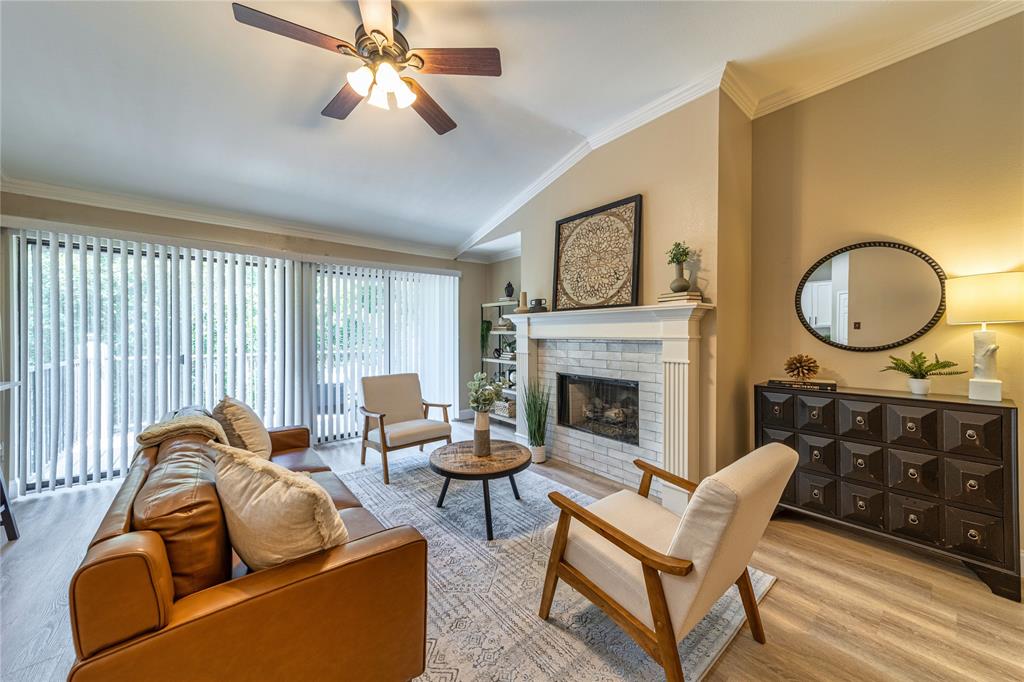 2036 Signal Ridge Place Rockwall, TX 75032 - Photo 1 of 28 Oversized open living area with huge glass patio doors to the balcony