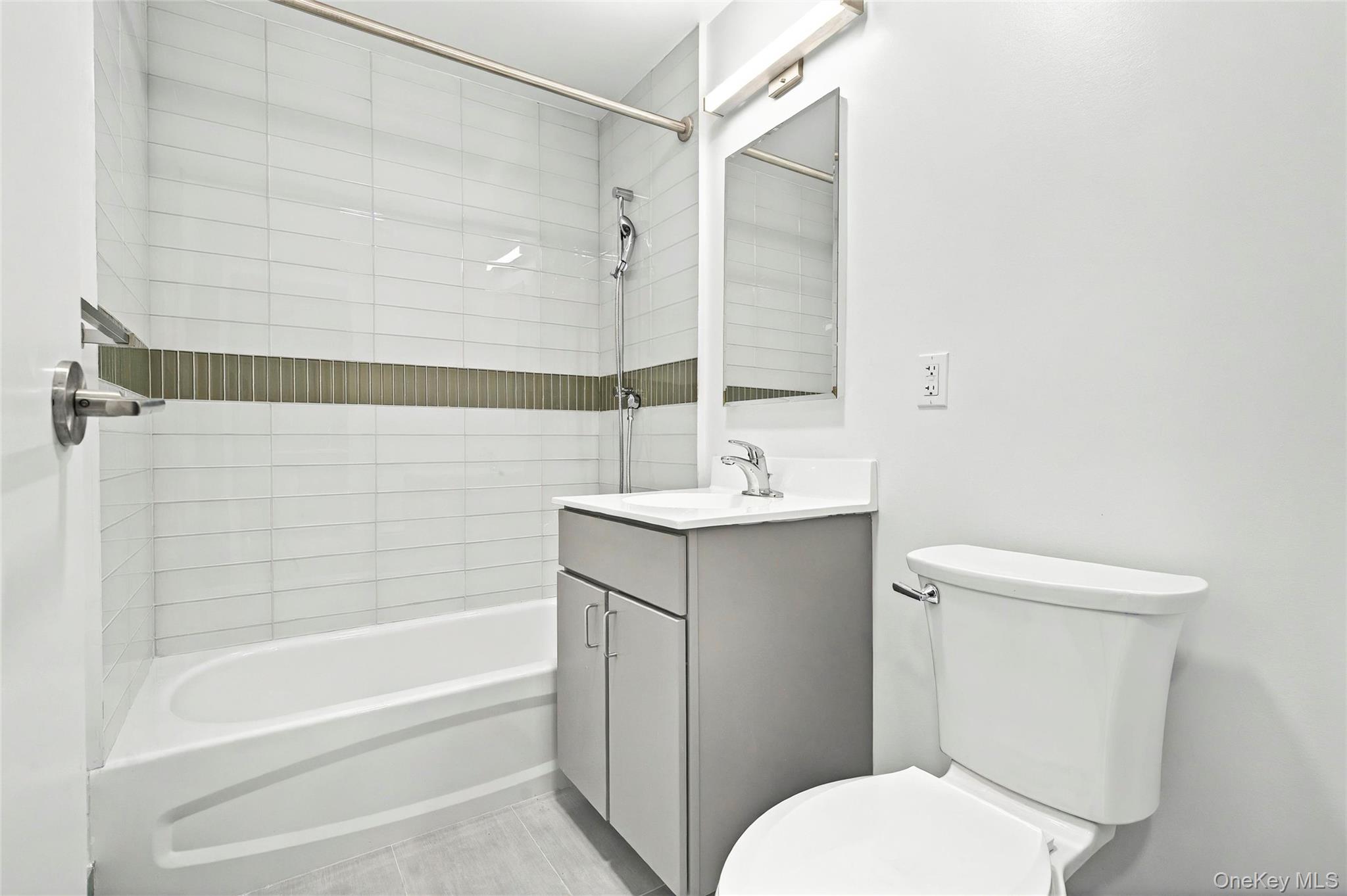 355 Bronx River Avenue, Unit 3B Bronx, NY 10473 - Photo 19 of 24 a bathroom with a sink toilet and shower