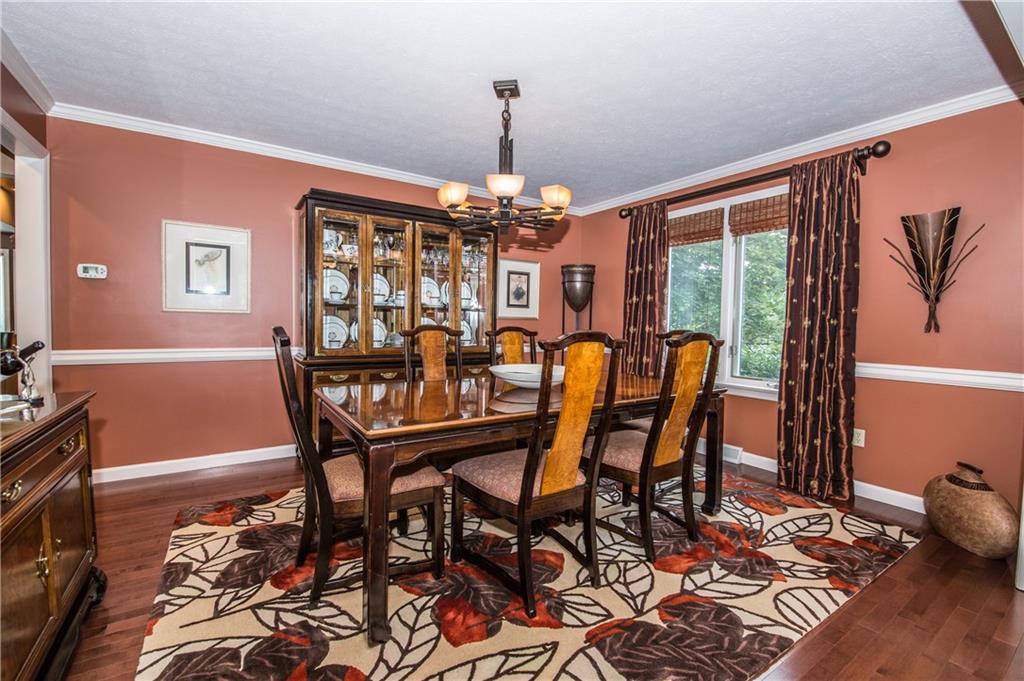 178 Shadow Ridge Drive Pittsburgh, PA 15238 - Photo 14 of 25 Spacious Dining Room with beautiful hardwood floors, chair rail/crown moulding and natural light.