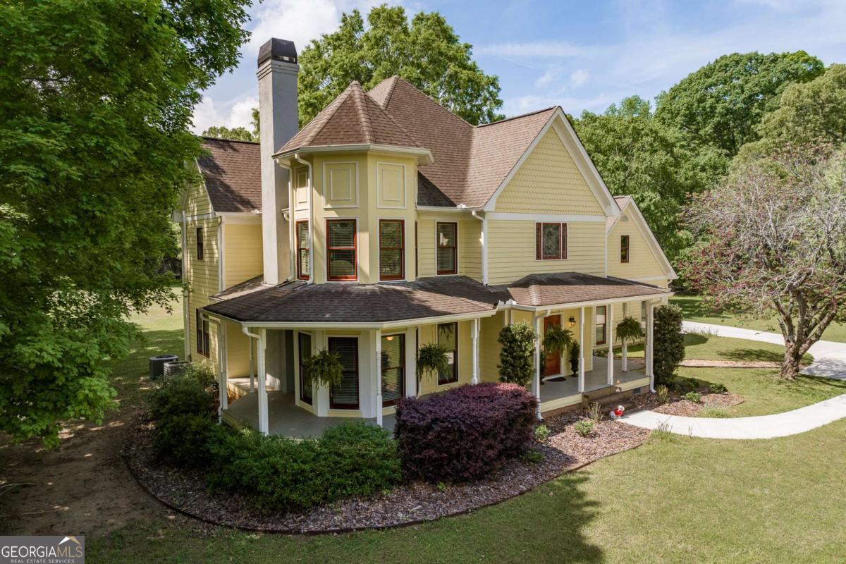265 Millstone Circle Athens, GA 30605 - Photo 1 of 1 a front view of a house with garden