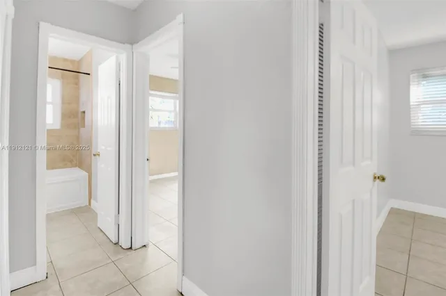 a bathroom with a sink and bathtub