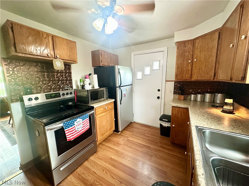 4260 Apple Pie Ridge Road Wellsburg, WV 26070 - Photo 9 of 42 Kitchen featuring appliances and ceiling fan