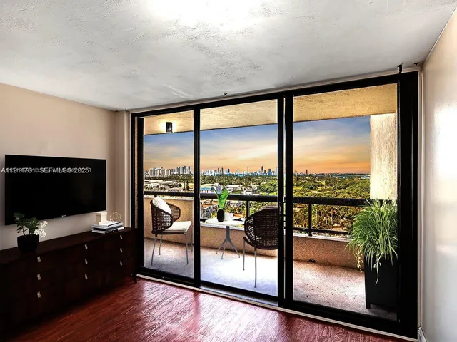 a living room with large windows