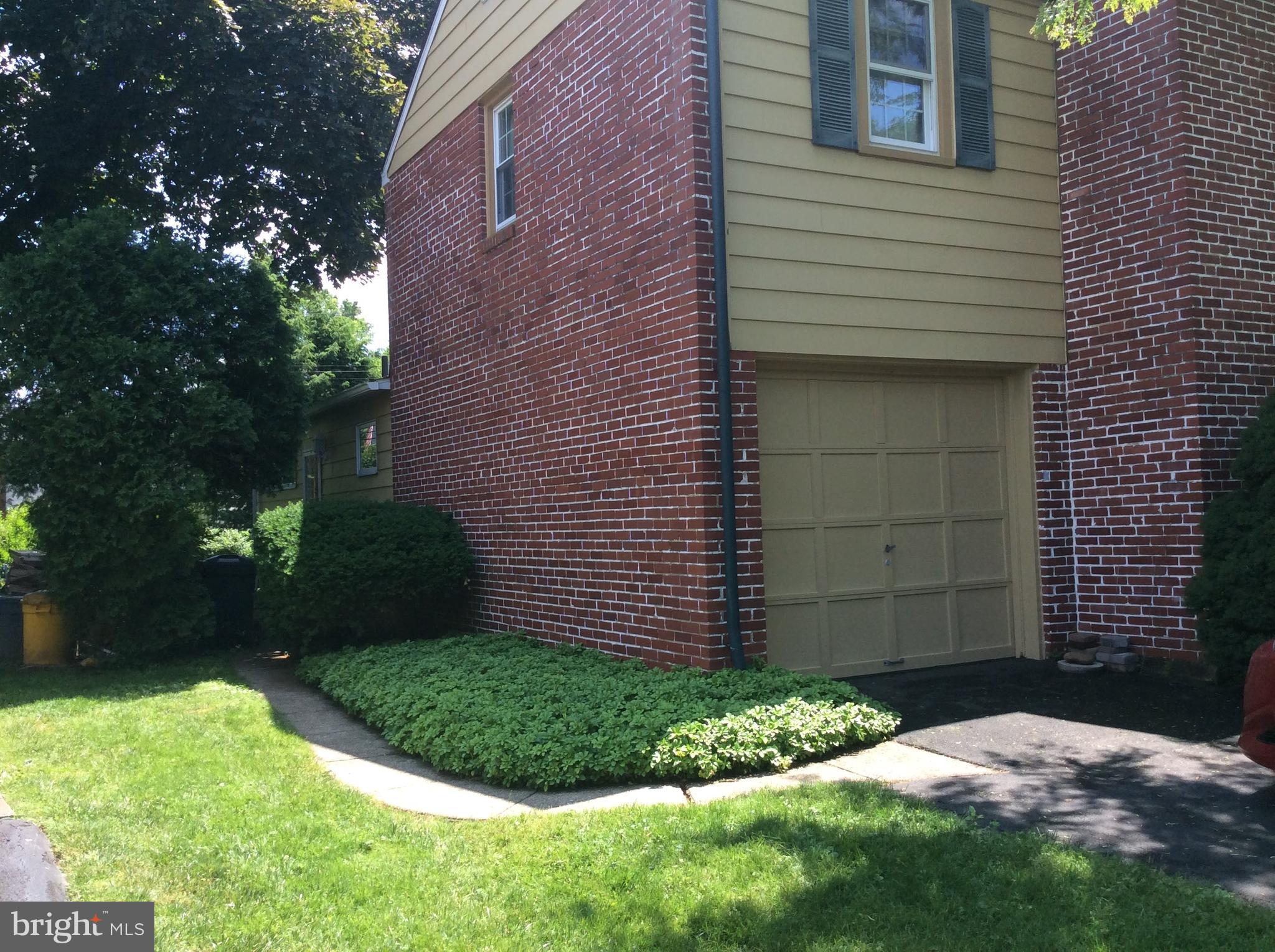 408 West Garden Road Oreland, PA 19075 - Photo 29 of 32 Walkway to Side Entrance