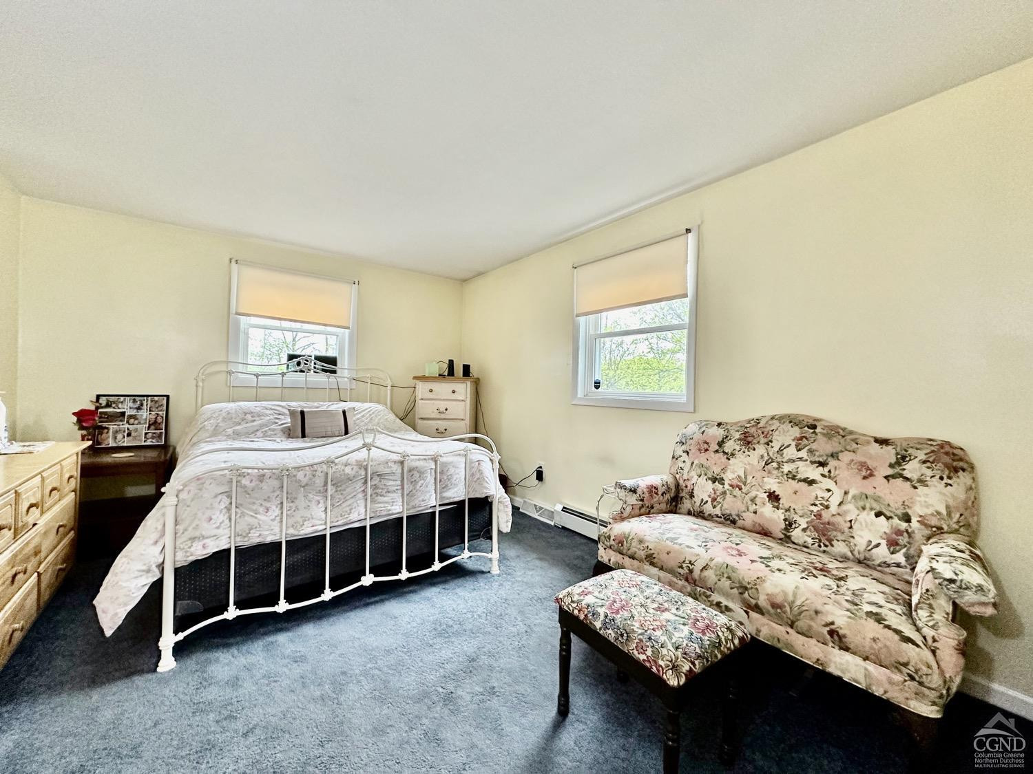 184 Snyderville Road Red Hook, NY 12571 - Photo 12 of 29 a bedroom with a bed and a couch