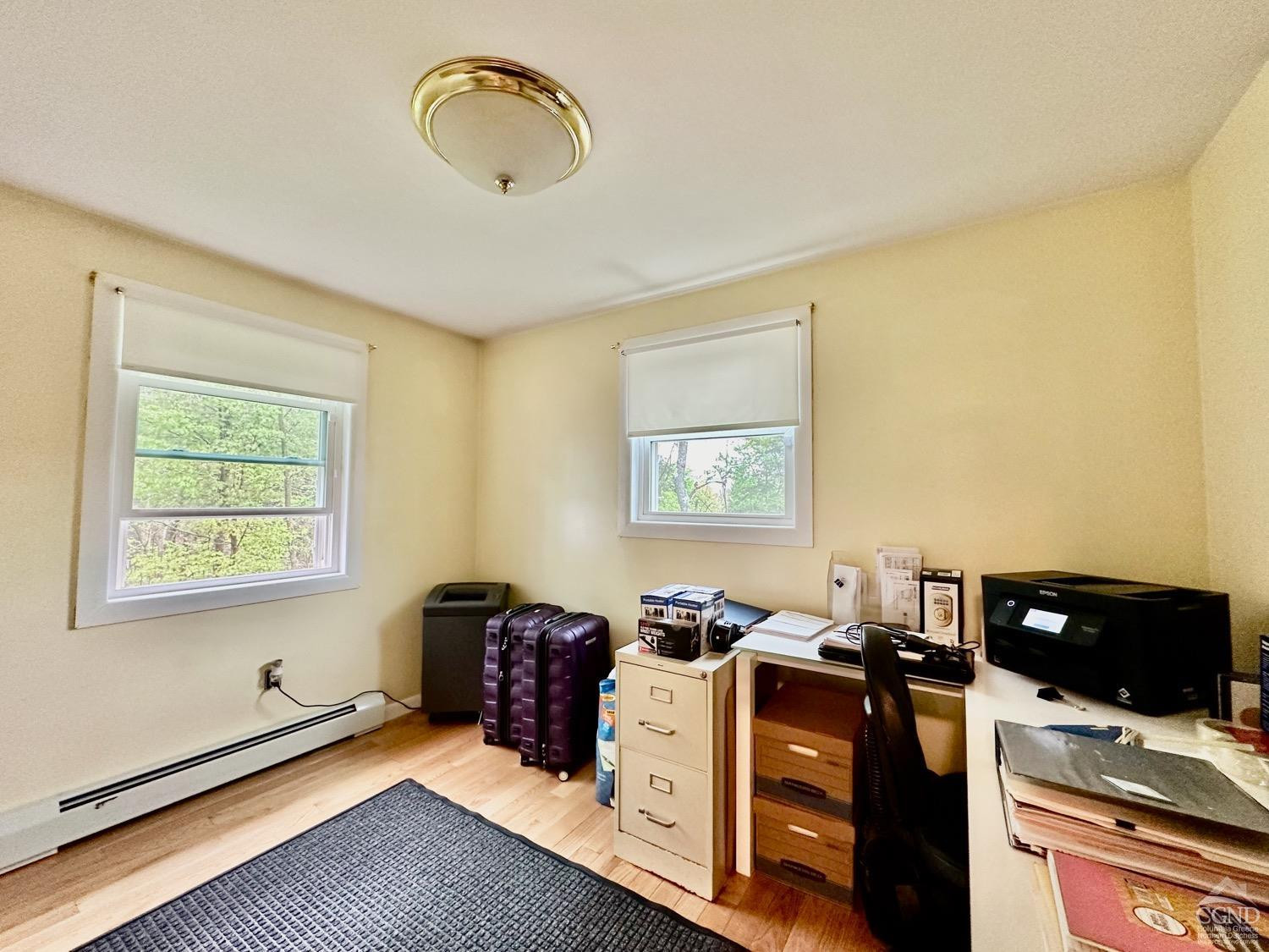 184 Snyderville Road Red Hook, NY 12571 - Photo 13 of 29 a view of workspace with wooden floor and window
