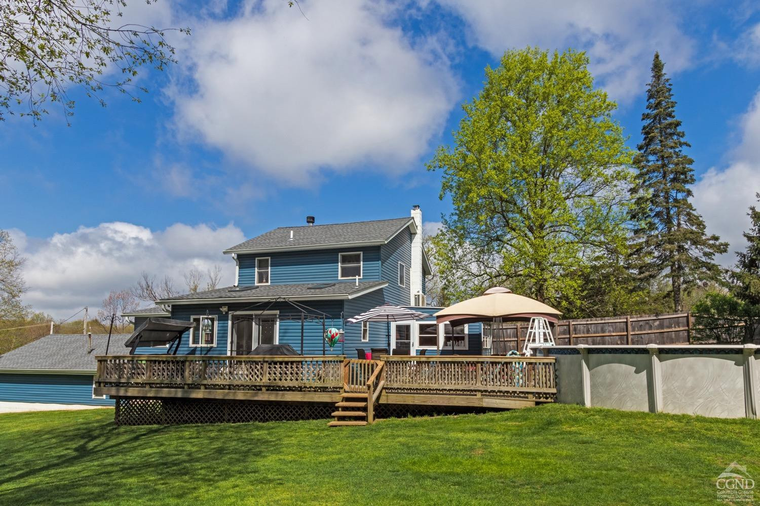 184 Snyderville Road Red Hook, NY 12571 - Photo 20 of 29 a front view of a house with a yard