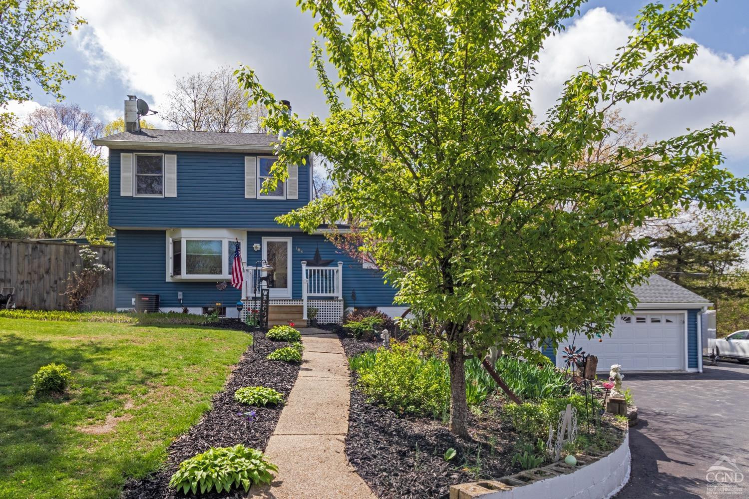 184 Snyderville Road Red Hook, NY 12571 - Photo 2 of 29 front view of a house with a yard