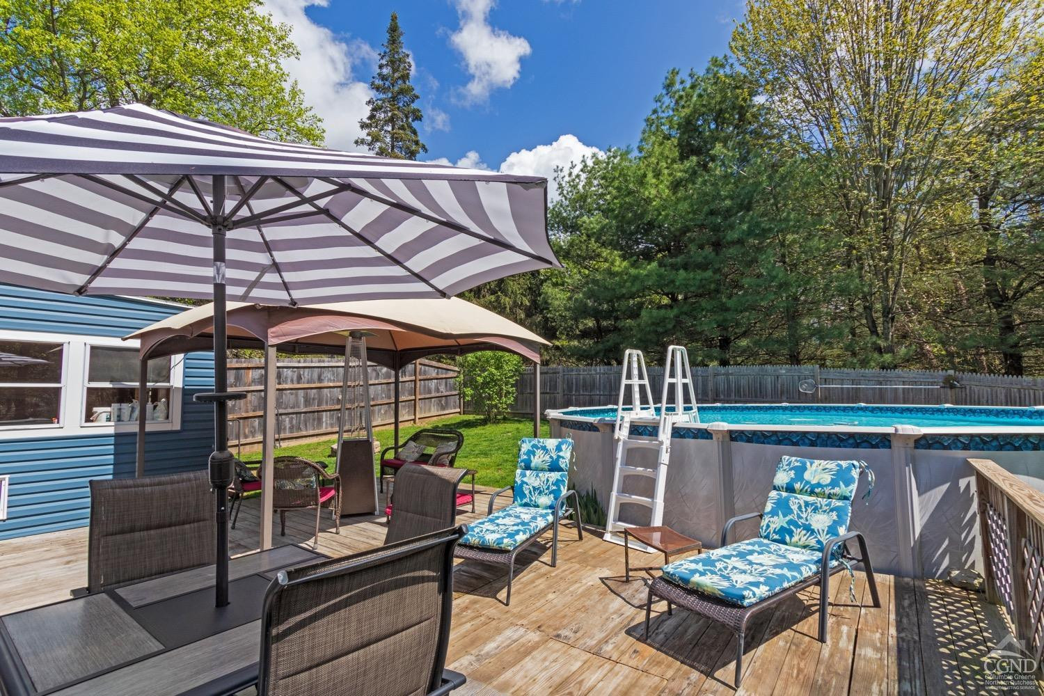 184 Snyderville Road Red Hook, NY 12571 - Photo 22 of 29 an outdoor space with furniture and umbrella