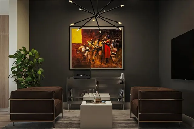 a room with furniture and flat screen tv