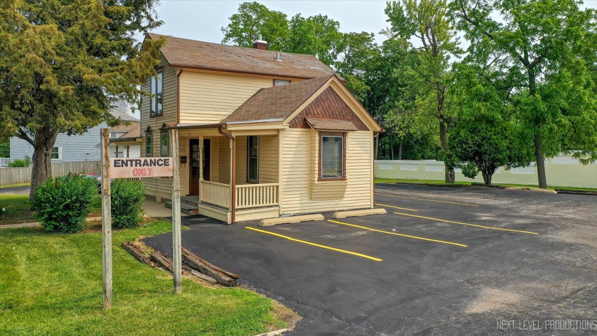 6-21 North 9th Street St. Charles, IL 60174 - Photo 14 of 23 a view of a house with a yard