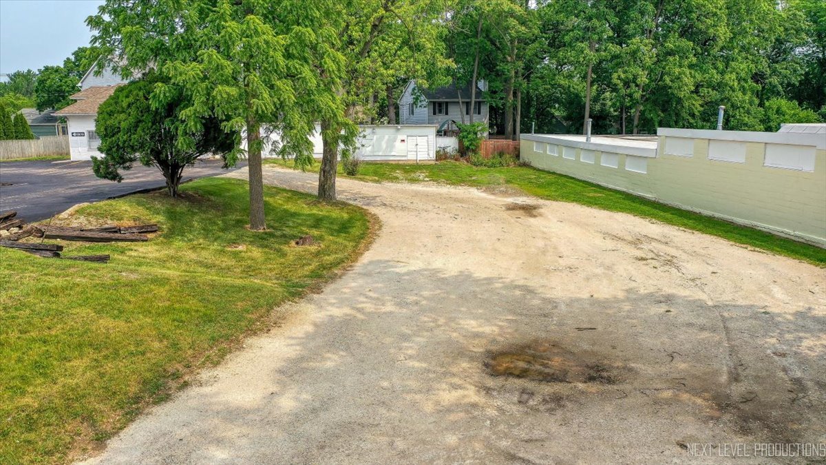 6-21 North 9th Street St. Charles, IL 60174 - Photo 16 of 23 a view of a backyard with a small cabin