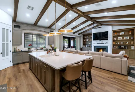 a kitchen with a cabinets and window
