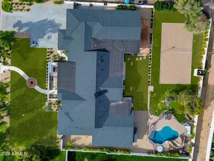 an aerial view of a house with a garden