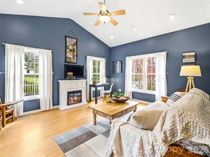 a bedroom with a bed and a fireplace