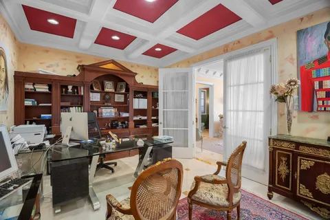 a bedroom with furniture and wooden floor