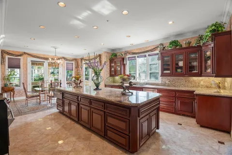a view of a balcony with wooden fence and floor