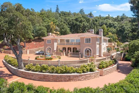 a front view of a house with glass windows