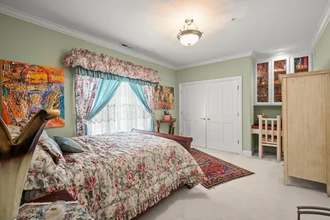 a view of balcony with wooden floor and outdoor seating