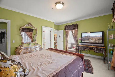 a view of a patio with a table chairs and a patio