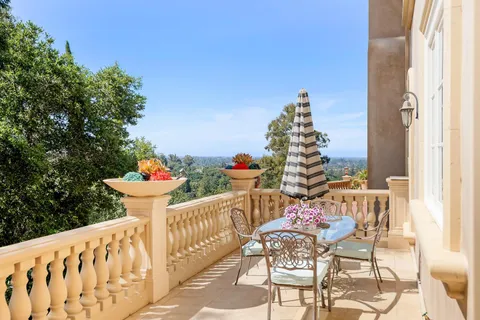 a outdoor living space with furniture and garden view