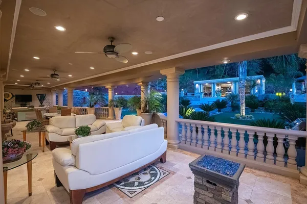 a view of a chairs and table in the terrace