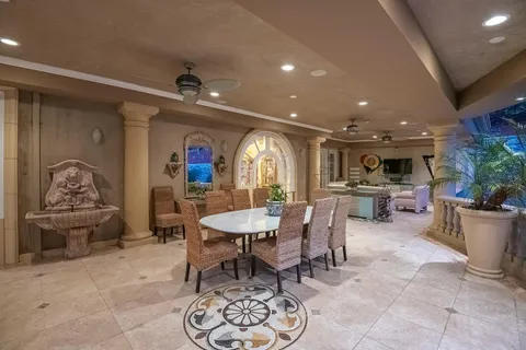 a wooden bench sitting in front of a building