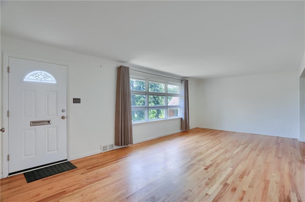 5504 Rippey Place Pittsburgh, PA 15206 - Photo 3 of 37 Spacious open living room and dining room floor plan