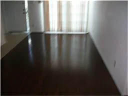 a view of wooden floor and stairs