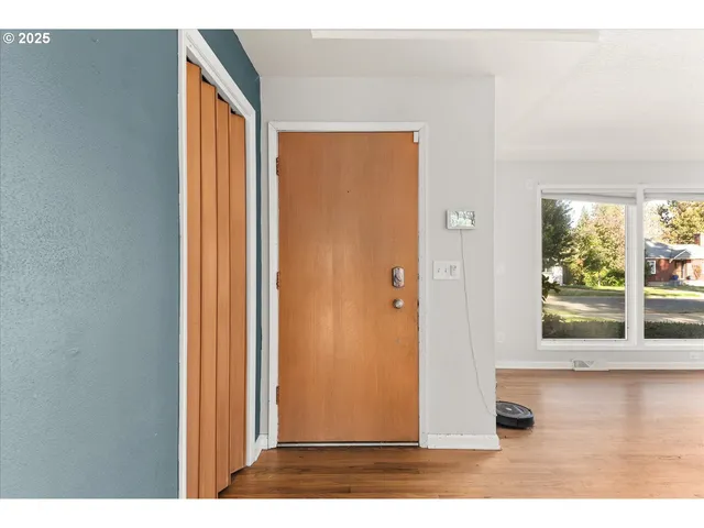 a view of a room that has a window in it