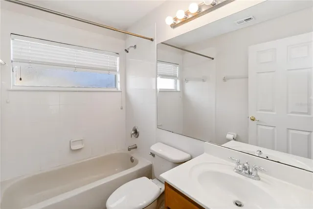 a bathroom with a sink and a bathtub