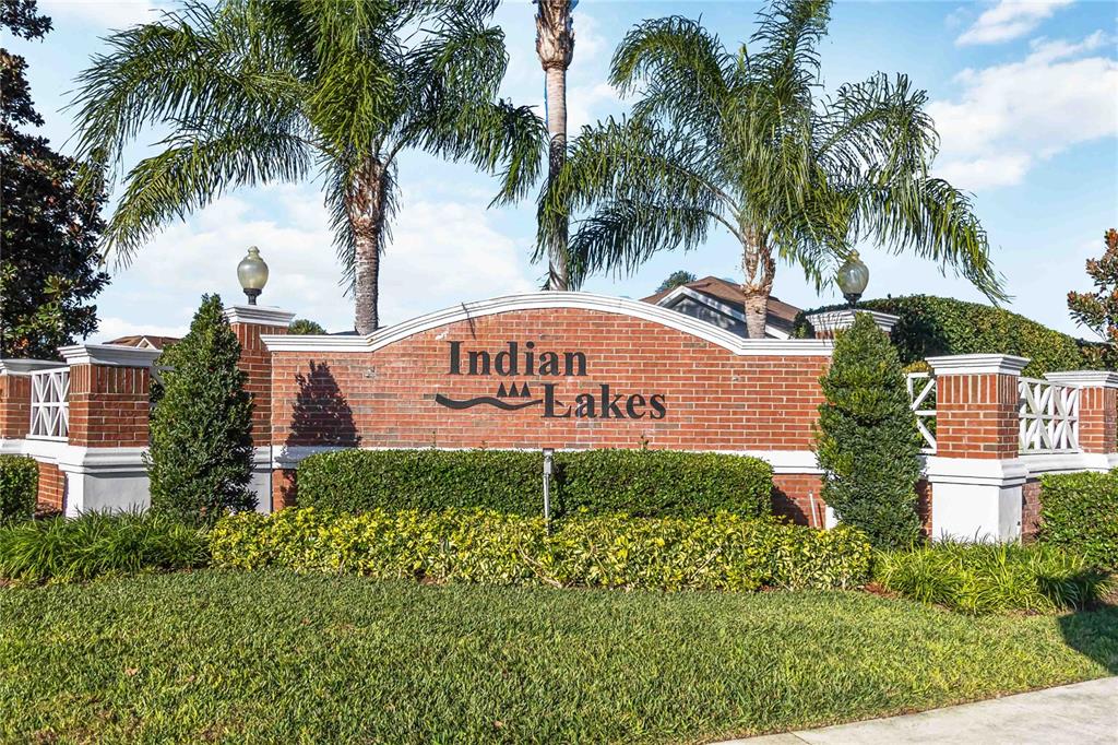 4136 Maidu Court St. Cloud, FL 34772 - Photo 36 of 40 a sign board with a garden