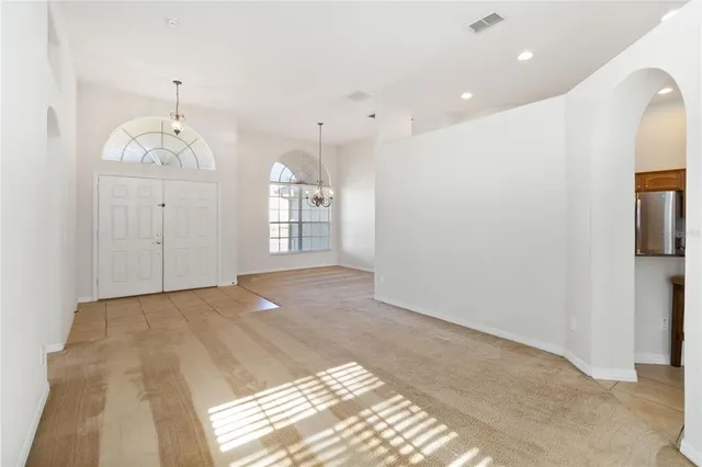 a view of an empty room and window