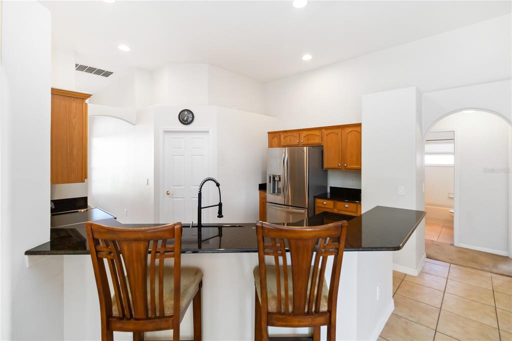 4136 Maidu Court St. Cloud, FL 34772 - Photo 8 of 40 a view of a dining room with furniture