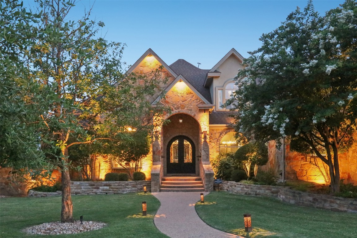 122 Silverstone Drive Georgetown, TX 78633 - Photo 1 of 40 a front view of a house with garden