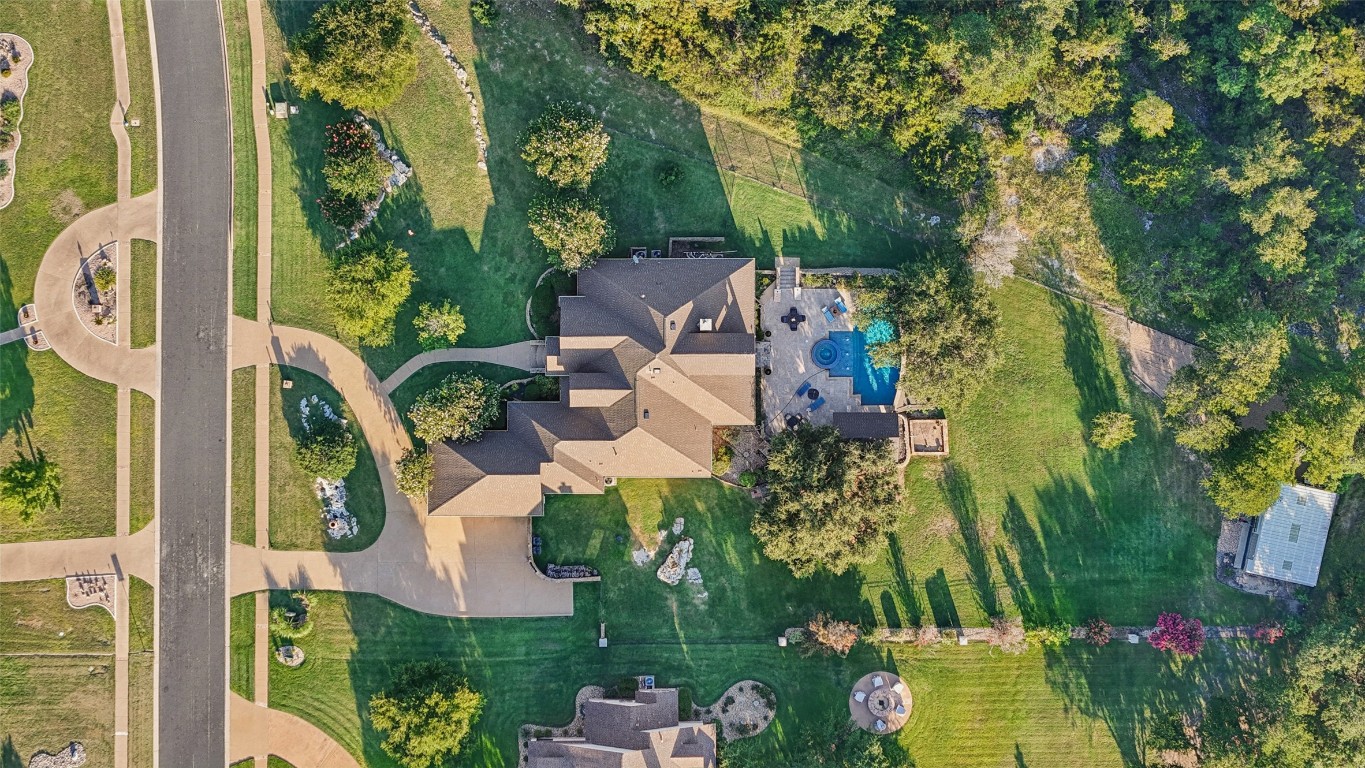 122 Silverstone Drive Georgetown, TX 78633 - Photo 13 of 40 an aerial view of residential house with outdoor space and trees all around