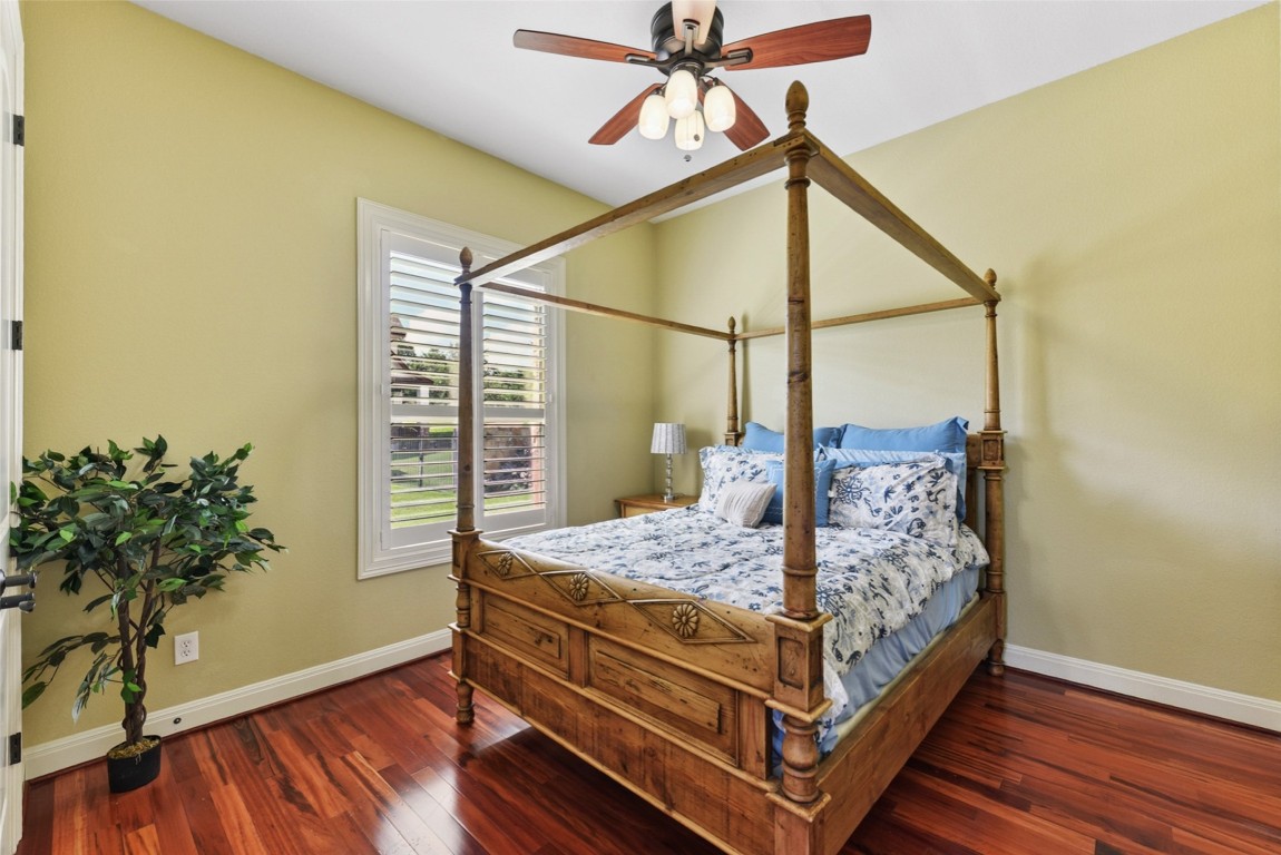 122 Silverstone Drive Georgetown, TX 78633 - Photo 30 of 40 a bedroom with a bed and a window