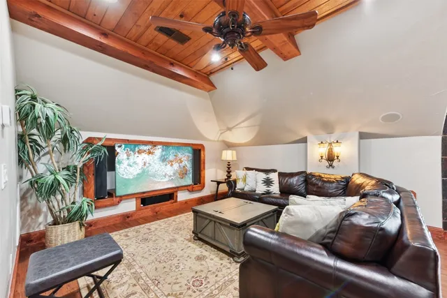 a view of a house with swimming pool and sitting area