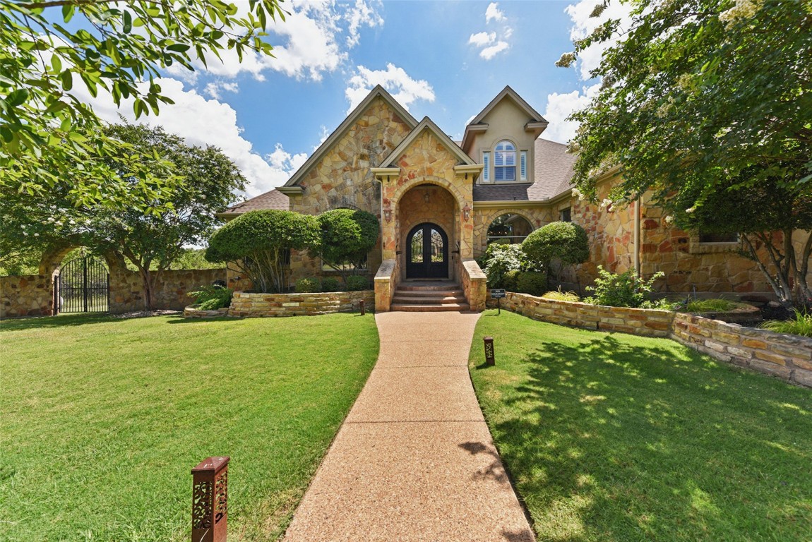 122 Silverstone Drive Georgetown, TX 78633 - Photo 7 of 40 a front view of a house with garden
