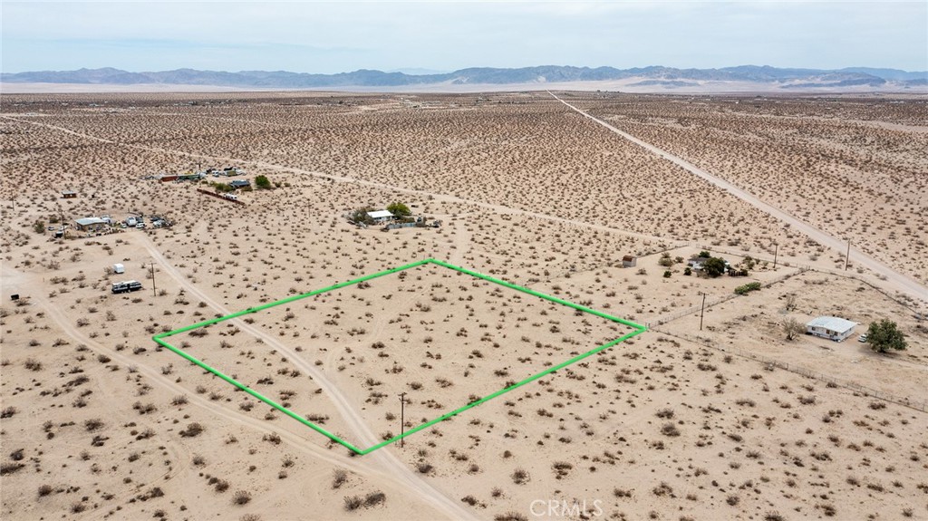 64700 Sunshine Lane Joshua Tree, CA 92252 - Photo 4 of 13 a view of an ocean beach and mountain