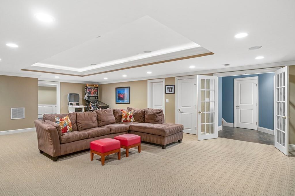 150 Wellesley Street Weston, MA 02493 - Photo 23 of 31 a living room with furniture and a couch