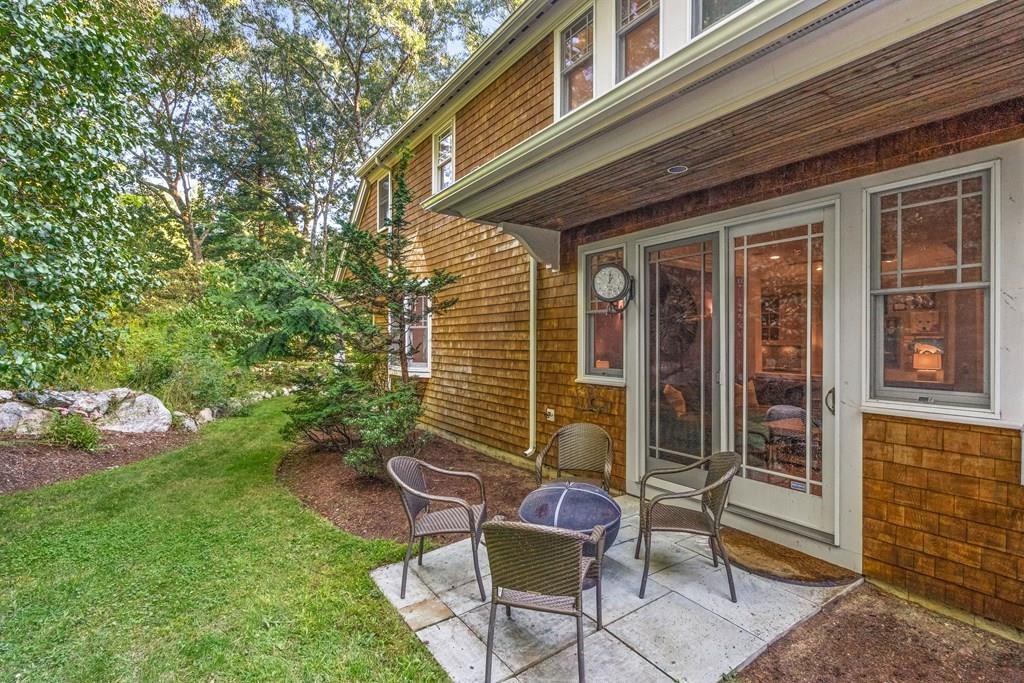 150 Wellesley Street Weston, MA 02493 - Photo 30 of 31 a front view of a house with outdoor seating